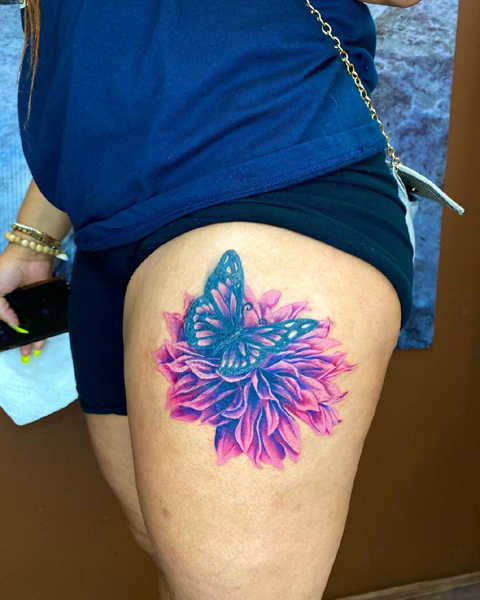 Dahlia And Butterfly Tattoo On The Thigh