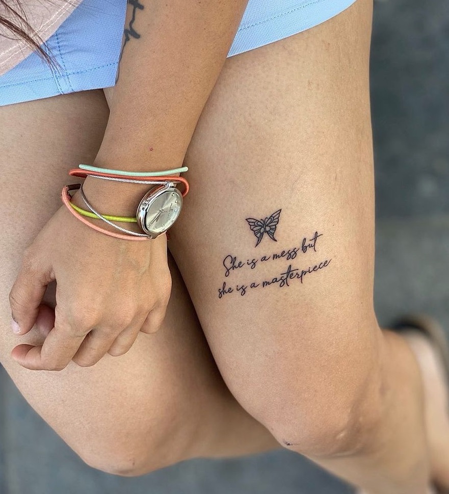 Delicate Words And Wings Thigh Tattoo