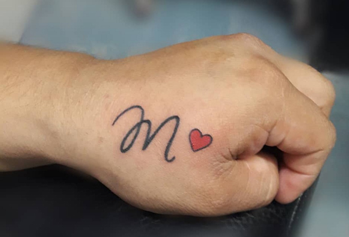 Expressive M Font Tattoo With A Heart