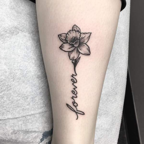 Expressive Daffodil Tattoo With A Name