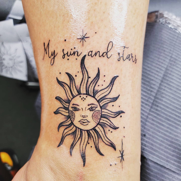 Feminine Sun Tattoo With Stars