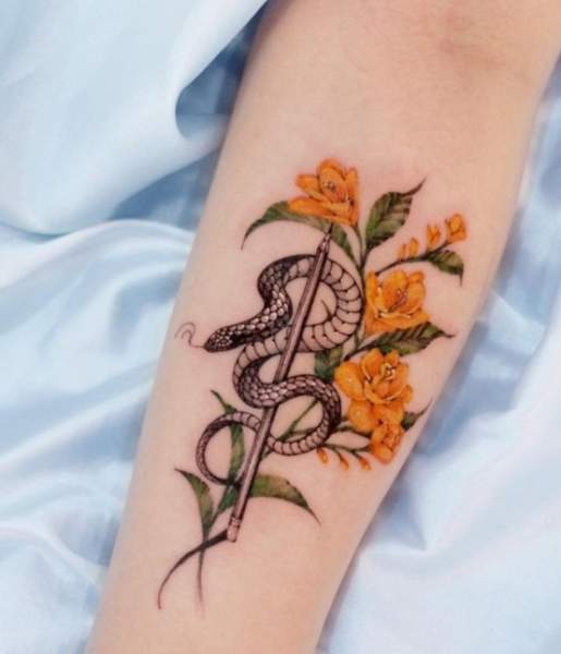 Freesia Tattoo With A Sensuous Snake