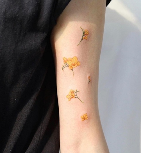 Yellow Freesia Tattoo On The Arm