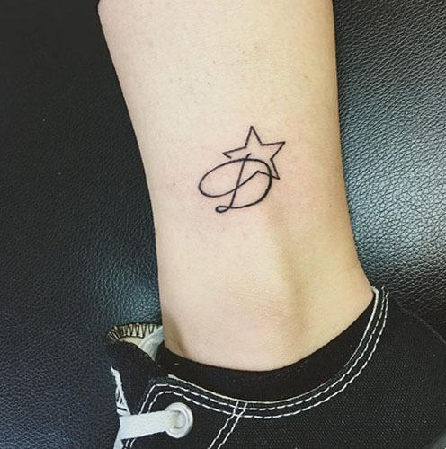 D Letter Tattoo With A Star On The Ankle