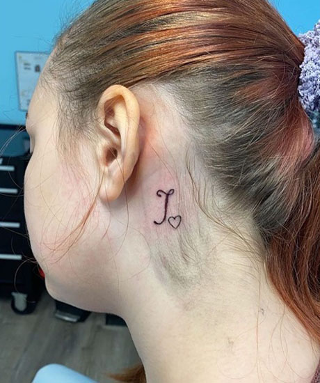 Impressive J Tattoo Behind Ear
