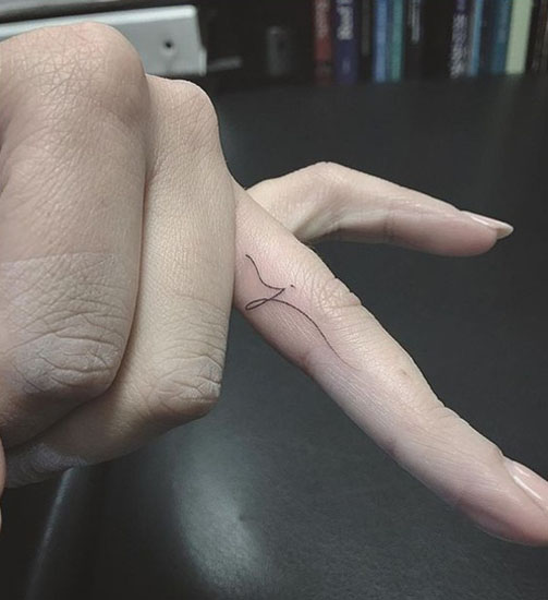J Tattoo On The Ring Finger