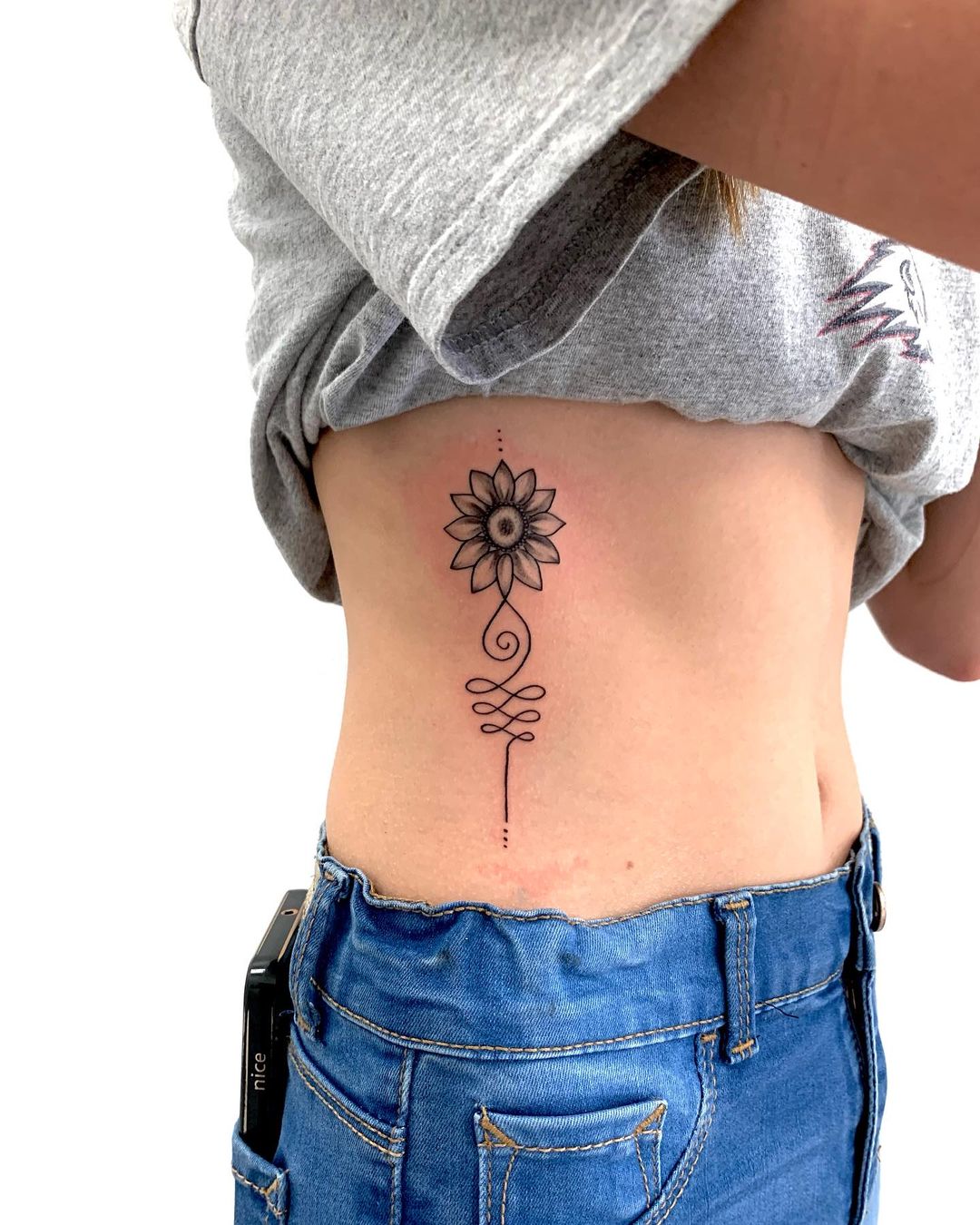 Chic Sunflower Rib Tattoo