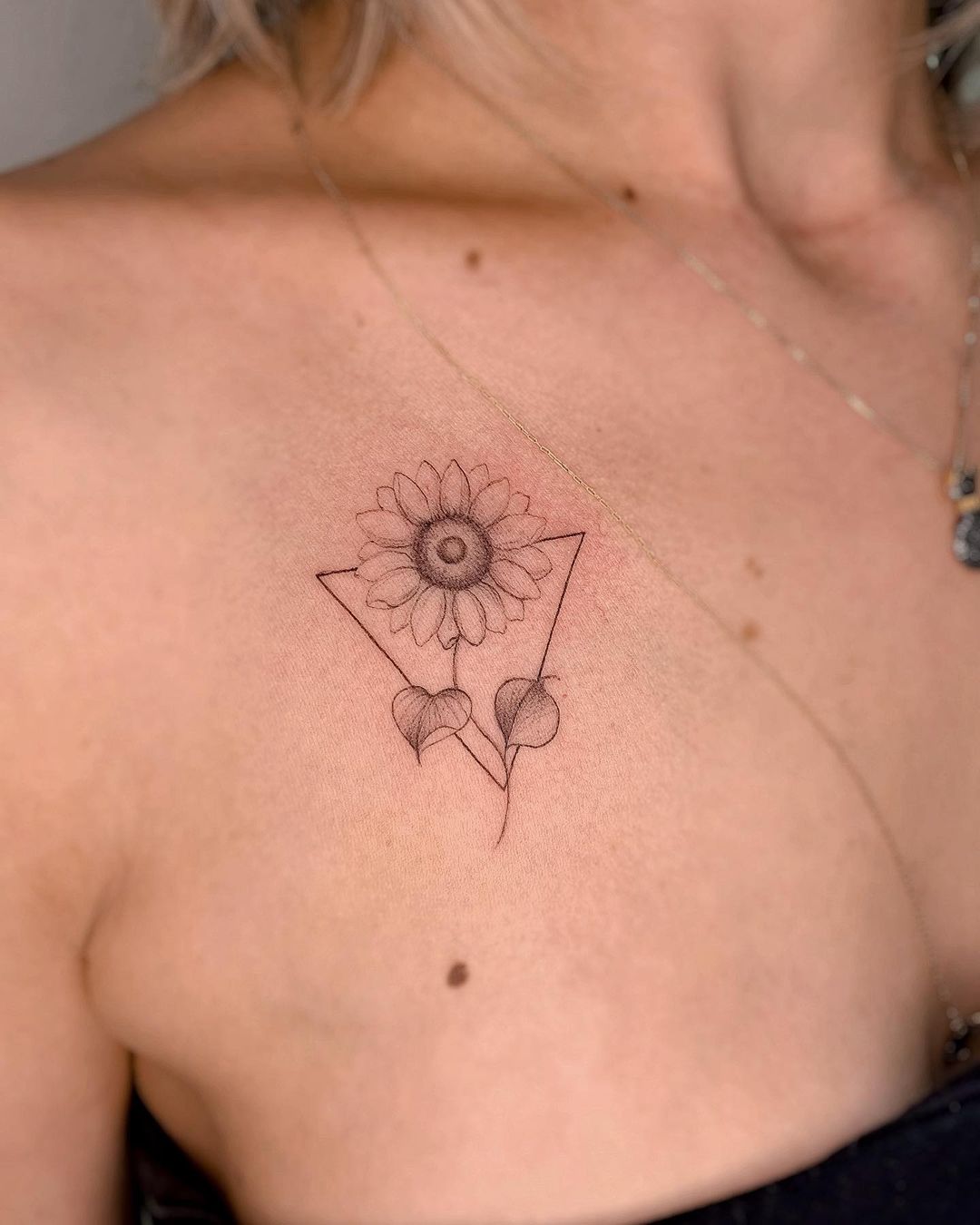 Simple Geometric Sunflower Chest Tattoo