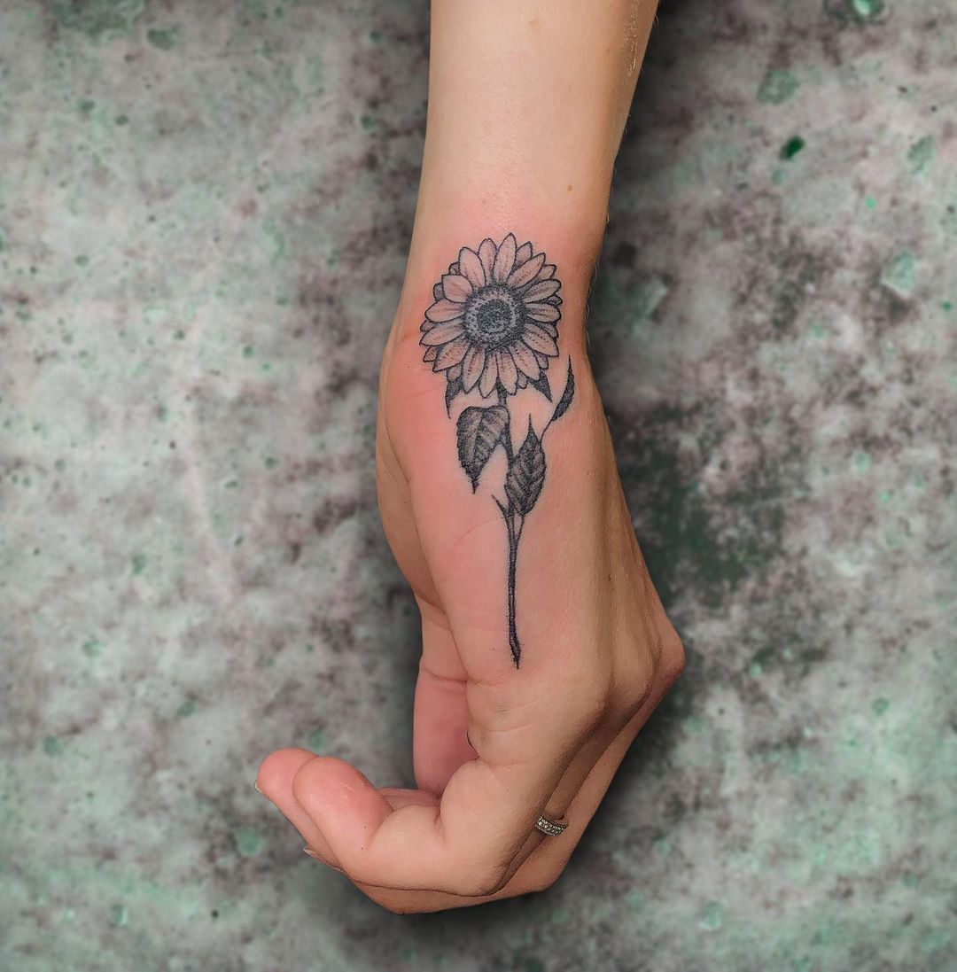Simple Sunflower Wrist Tattoo In Monochrome