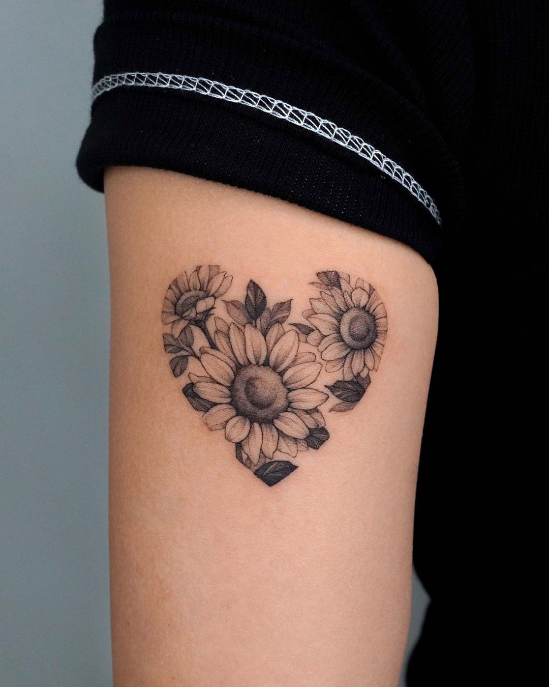 Sunflower Heart Tattoo On Thigh
