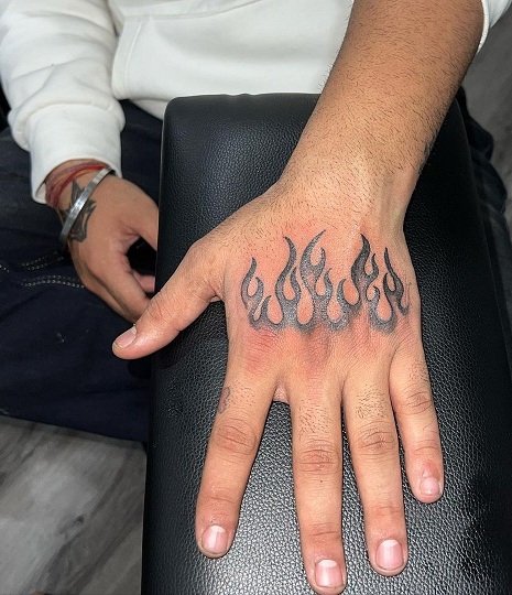 hand tattoos with pen flame on fingers｜TikTok Search