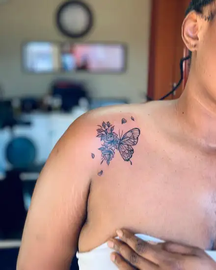 Fine line butterflies tattoo on the shoulder blade