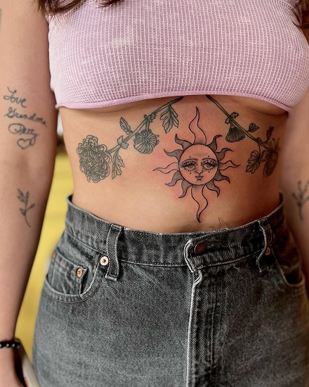 Sun Tribal Stomach Tattoos