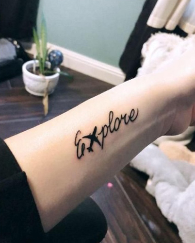 Adventurous E Letter Tattoo On The Arm
