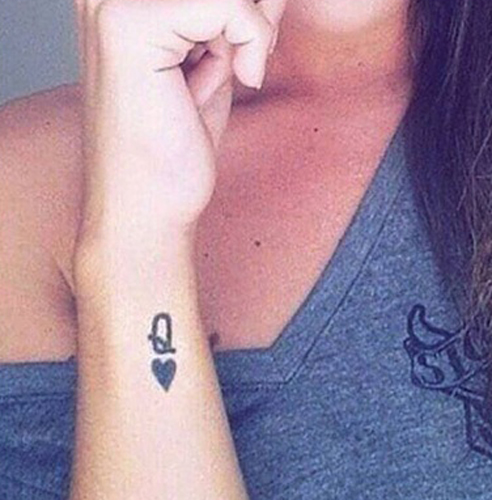 Cute Q Letter Tattoo Design