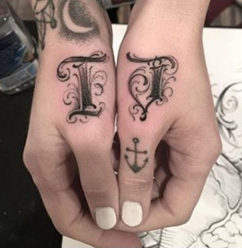 Expressive T Letter Tattoo