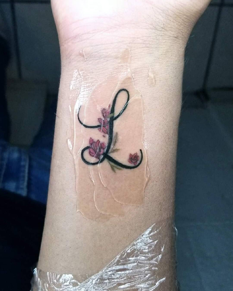 Flowery L Tattoo Meaning