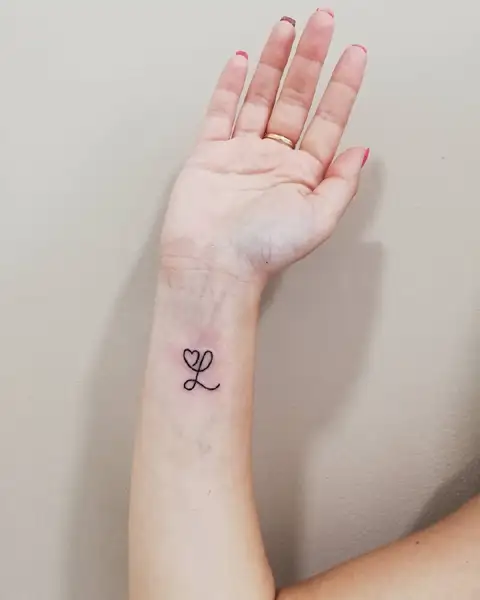 Initial tattoo RL  Initial tattoo Cool wrist tattoos Hand and finger  tattoos