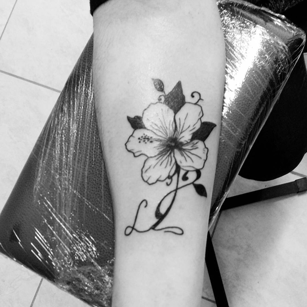 L Letter Tattoo With A Hibiscus Flower