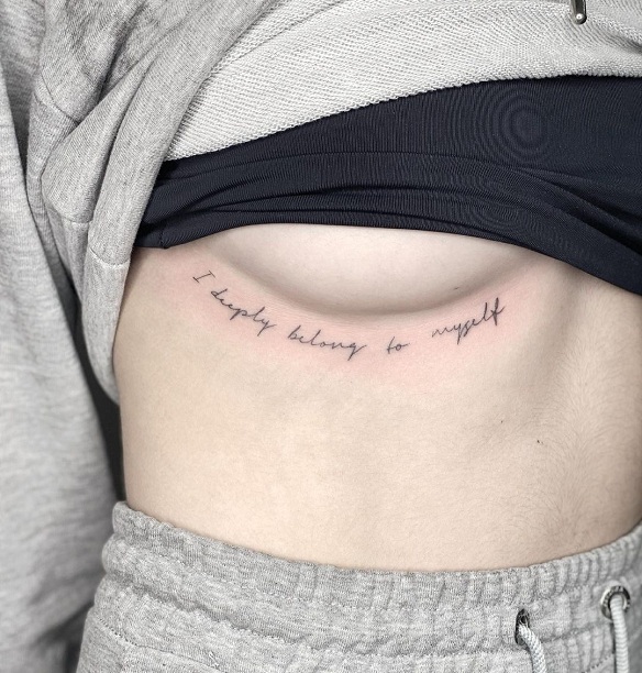 Quotation Under Breast Tattoo
