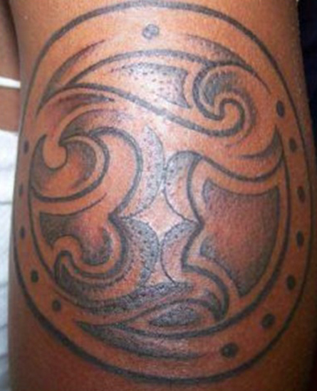 Robust T Alphabet Tattoo On The Arm