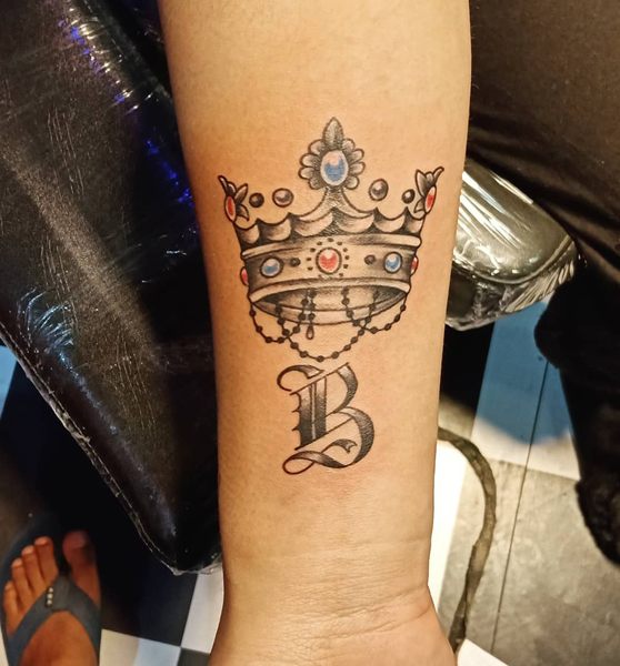 Royal B Letter Tattoo On The Arm