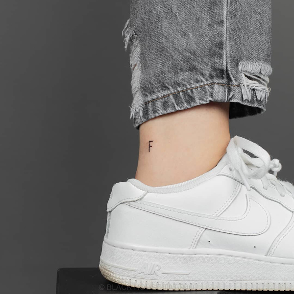 Simple F Letter Tattoo Near The Ankle