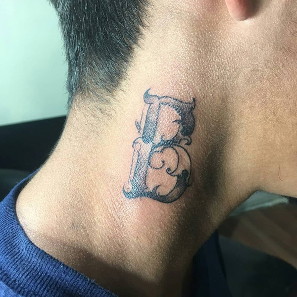 Stylish B Alphabet Tattoo On The Neck