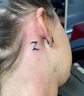 Z Letter Tattoo Behind The Ear