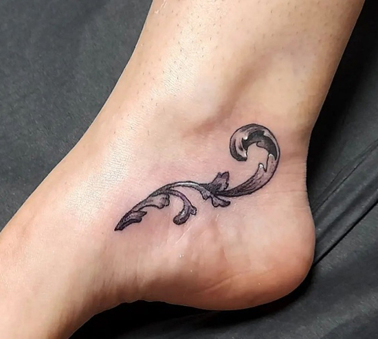 Cute Baroque Tattoo On The Leg
