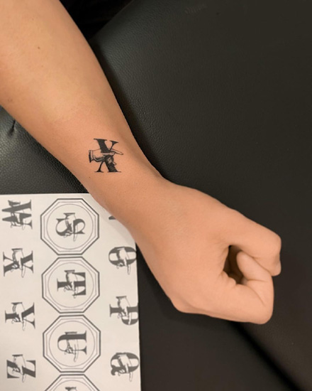 Bold X Letter Tattoo