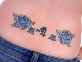 15 Beautiful Lower Back Tattoo Designs and Ideas!