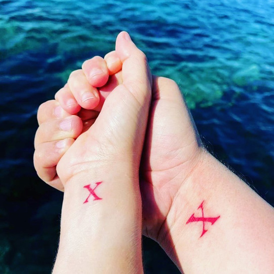Couples X Letter Tattoo