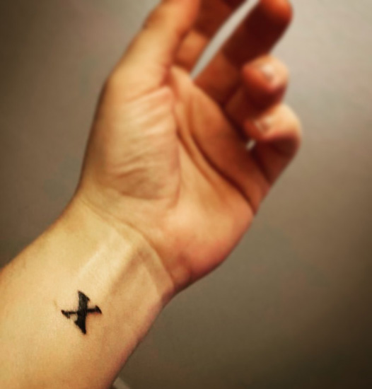 Standard X Letter Tattoo On The Wrist