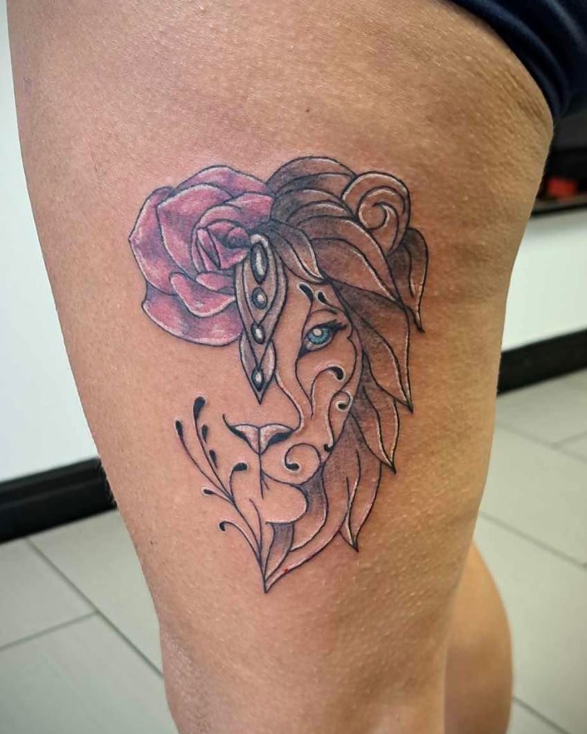 Artistic Lioness And Rose Leg Tattoo