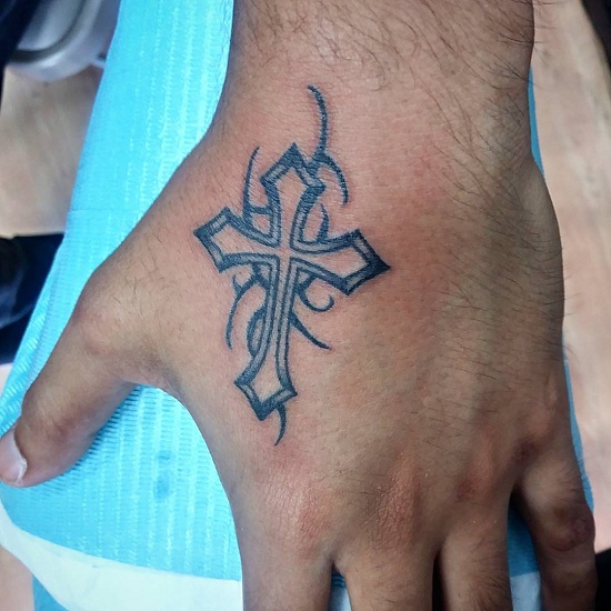 Cross Tattoo With Tribal On The Hand