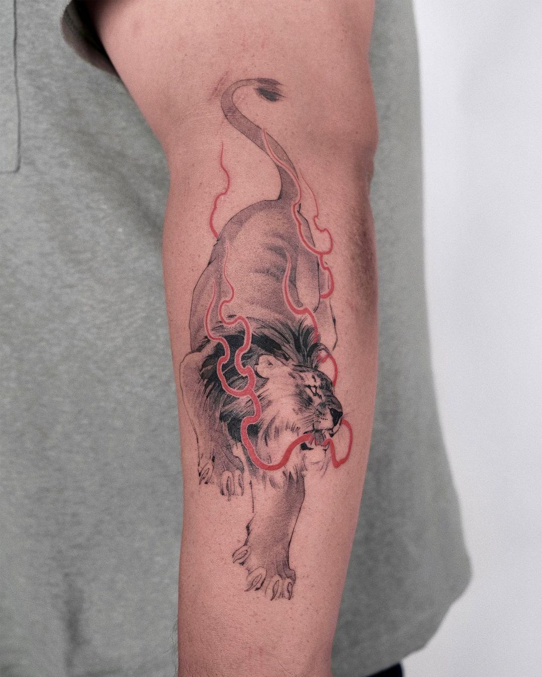 Fiery Lion Essence Forearm Tattoo