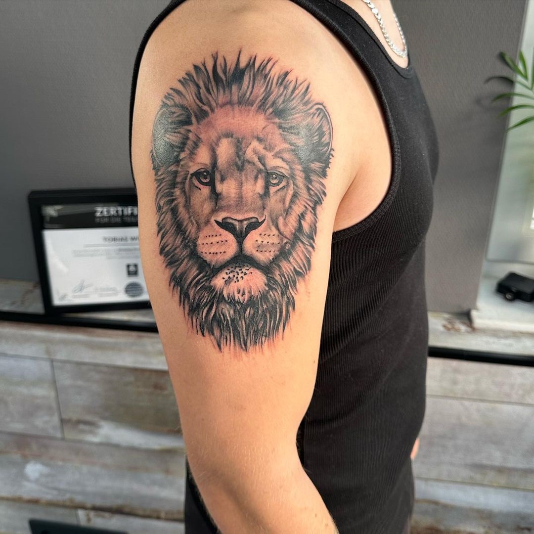 Regal Lion Shoulder Tattoo