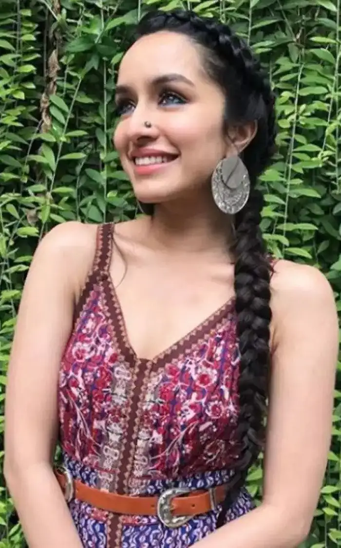 Beautiful Indian Female With Braided Hair Smiling Portrait With Tropical  Nature Background Stock Photo  Download Image Now  iStock