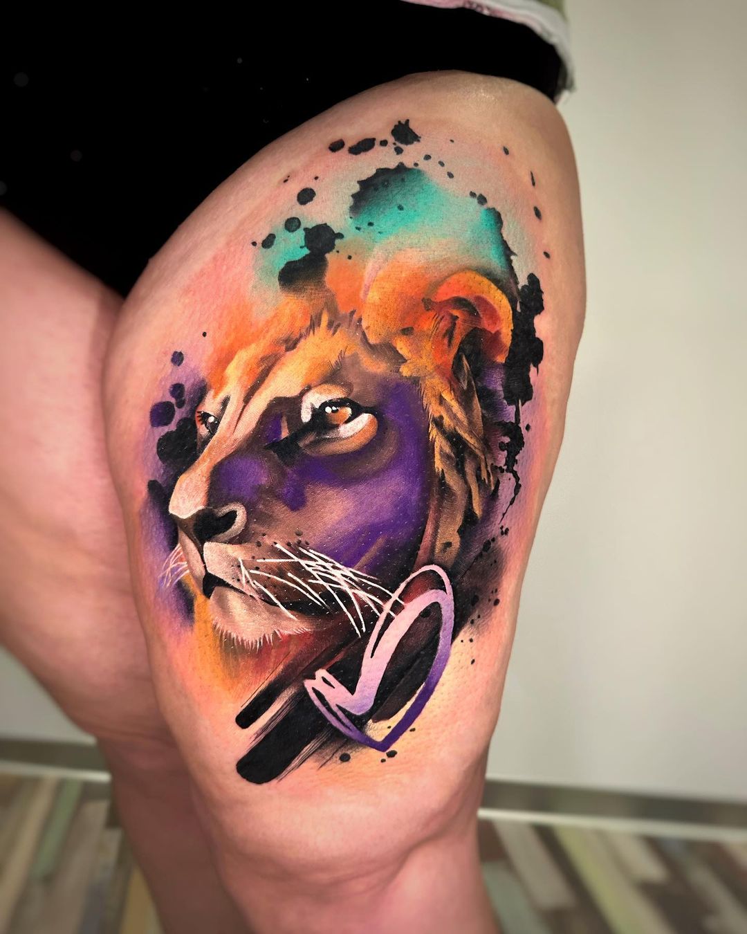 Vibrant Watercolor Lion Arm Tattoo