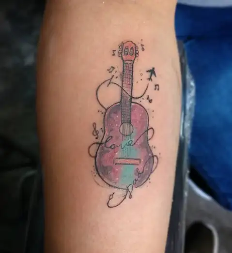 25 Creative Guitar Tattoo Designs  Guitar tattoo design Music tattoo  designs Music tattoos
