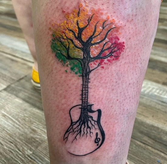 Cool Guitar Tattoo On The Leg