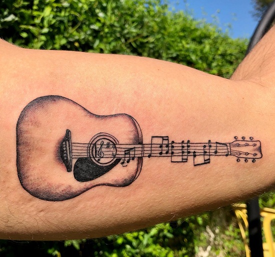 Enticing Guitar Music Note Tattoo