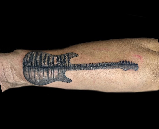 Guitar Tattoo Filled With Nature