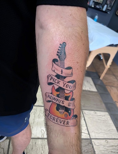 Traditional Guitar Tattoo With A Quote