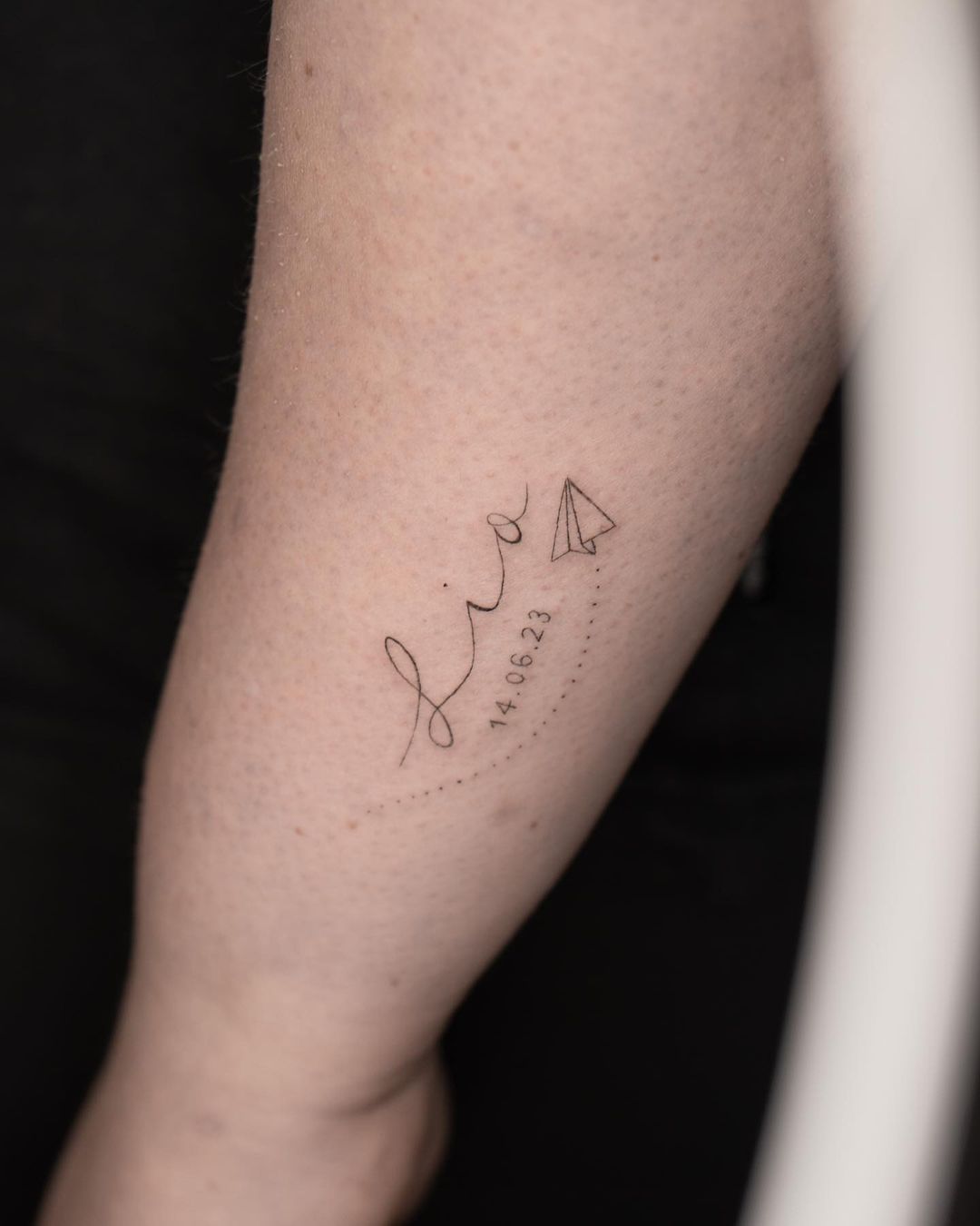 Chic 'lio' Name Tattoo With Paper Plane Design