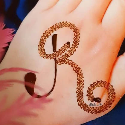 Expressive R Letter Tattoo Mehndi Design