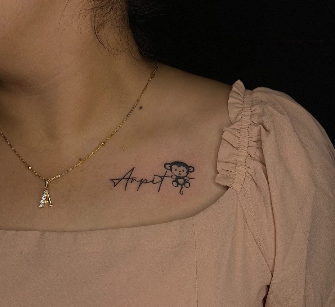 Lovely Name And Charm Tattoo On Shoulder