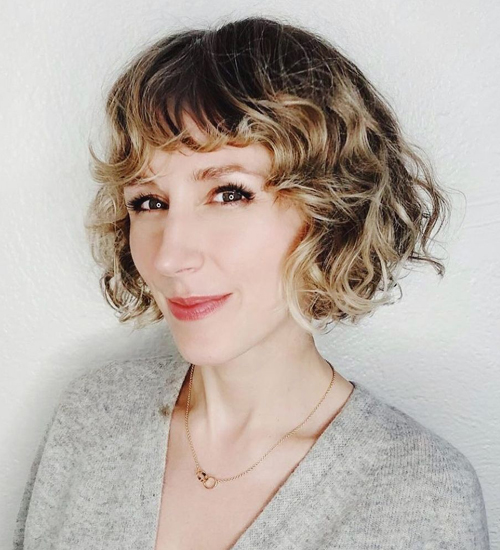 Sexy Platinum Mod Bob with Allover Messy Curly Texture and Long Side Swept  Curly Bangs - The Latest Hairstyles for Men and Women (2020) -  Hairstyleology