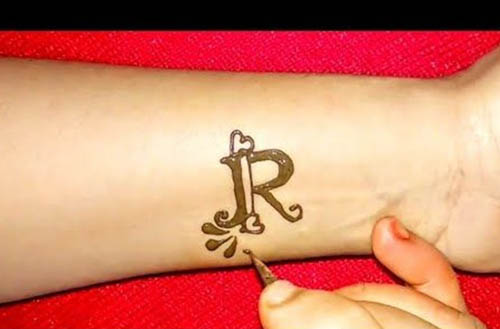R Tattoo Mehndi Design With A Small Heart